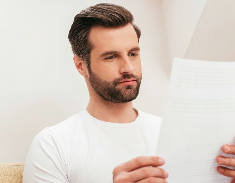 Man reading about a nominal defendant claims