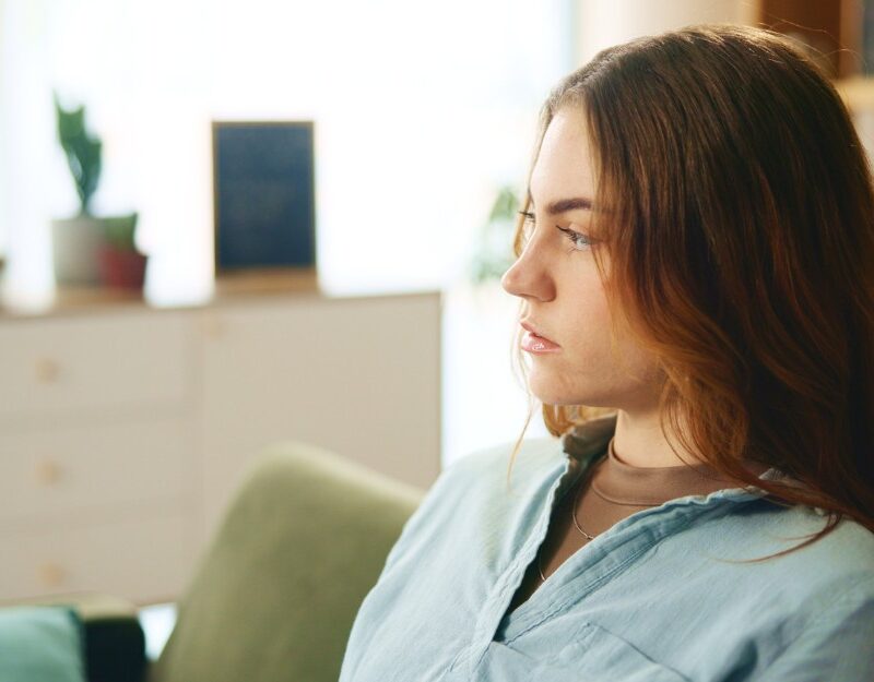 Pensive woman with a mental health condition, eligible for tpd claim for mental illness