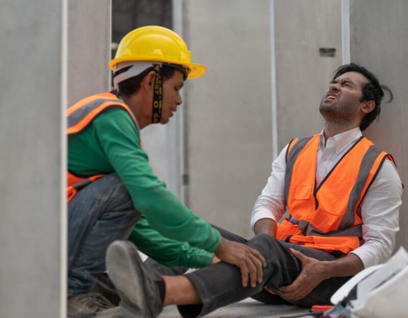 Engineer who had a construction site injury helped by worker
