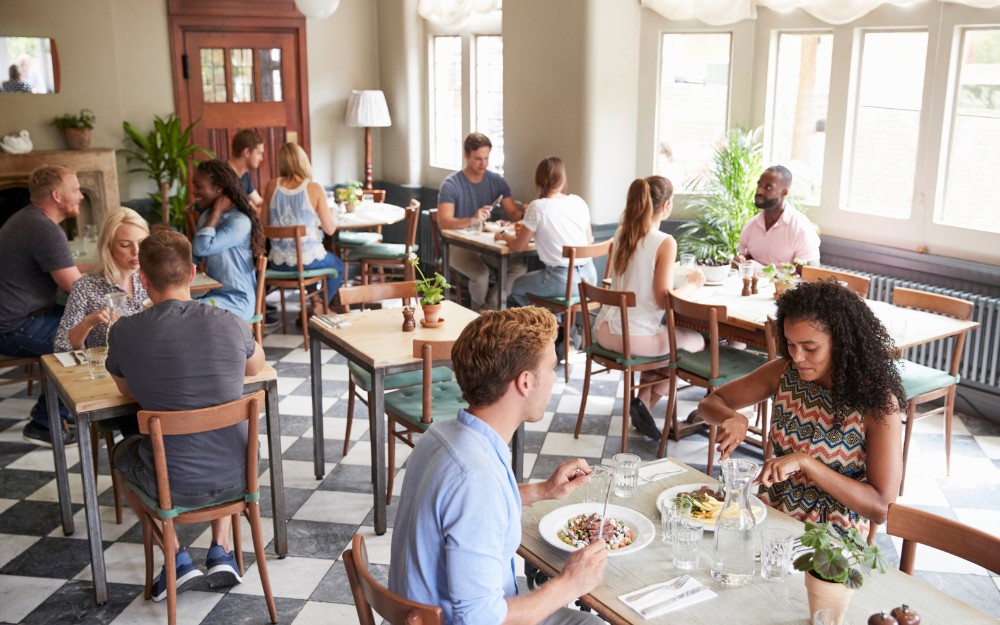 People dining at a restaurant, aware of restaurant negligence